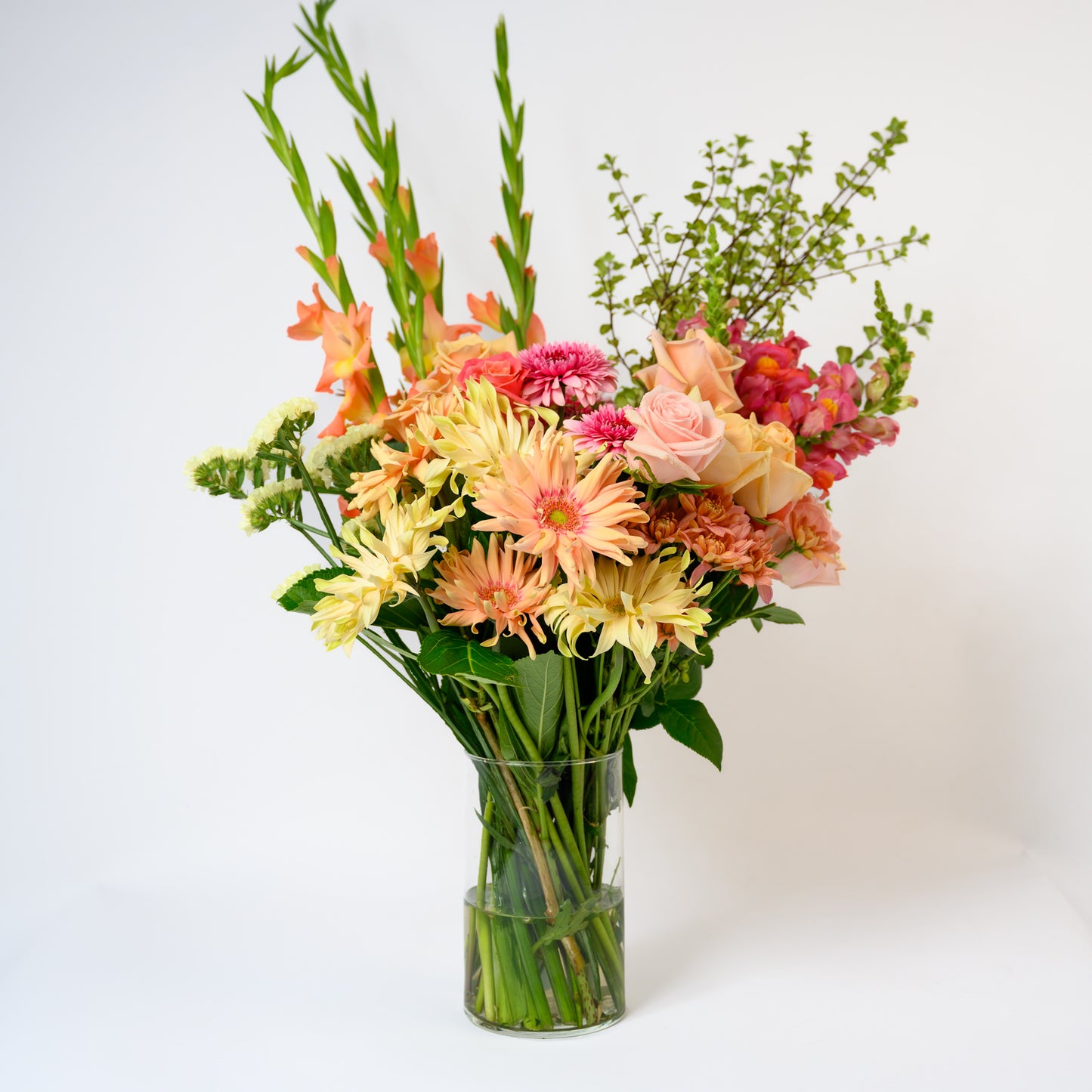 The Summer Sorbet bouquet is an exquisite blend of nature's most vibrant and refreshing colors, designed to evoke the sweet, cool delights of summer.