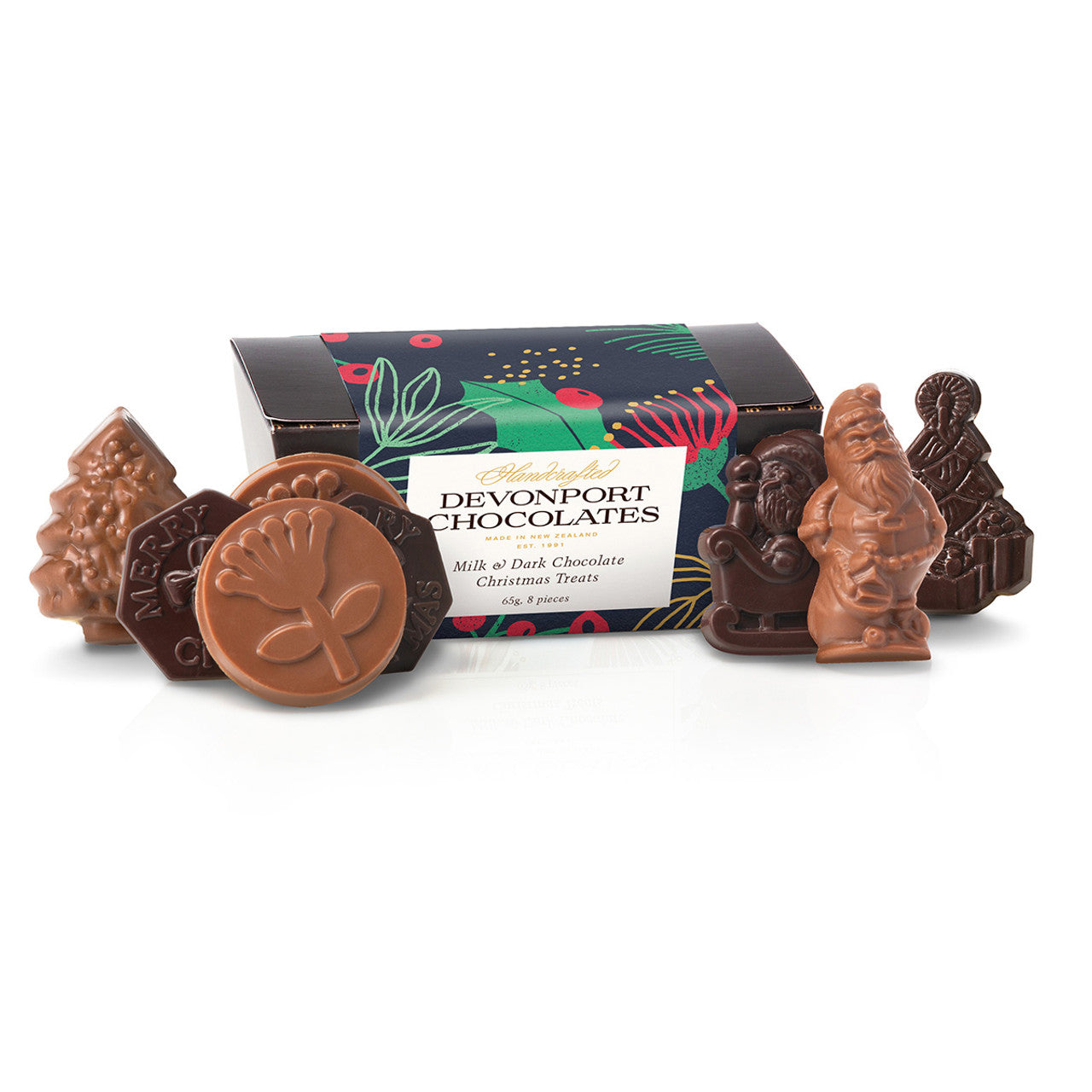Delicious chocolate in Christmas shapes including Christmas trees, Santa and Pohutukawa flowers.