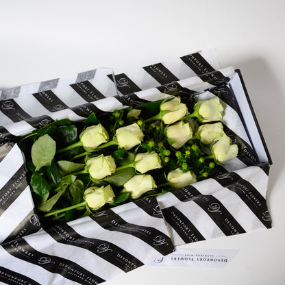One dozen premium grade roses available in several different stunning colour options. Every stem has its own water supply helping to keep the roses fresh during transport. Beautifully presented in a black box.