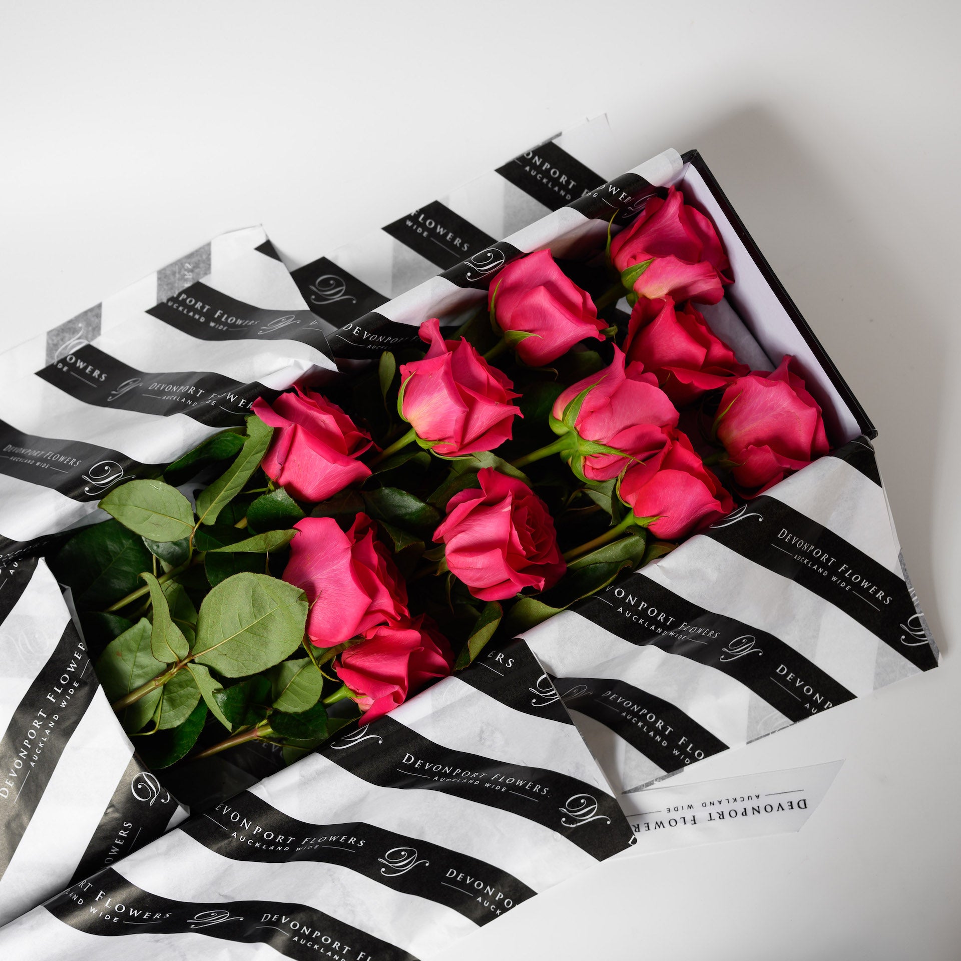 One dozen premium grade roses available in several different stunning colour options. Every stem has its own water supply helping to keep the roses fresh during transport. Beautifully presented in a black box.