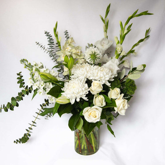 Let us design for you a dreamy bouquet of seasonally fresh white and green floral vibes for that someone special.