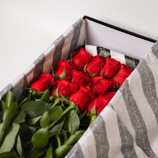 One dozen premium grade roses available in several different stunning colour options. Every stem has its own water supply helping to keep the roses fresh during transport. Beautifully presented in a black box.