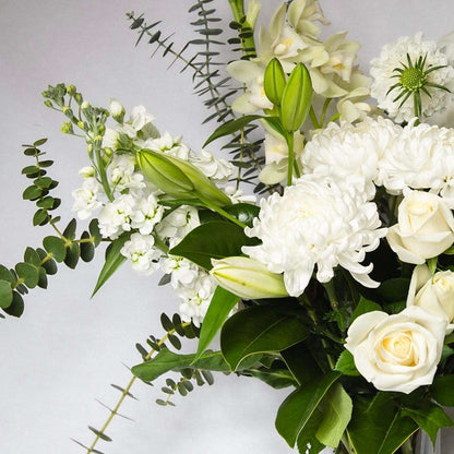 Let us design for you a dreamy bouquet of seasonally fresh white and green floral vibes for that someone special.