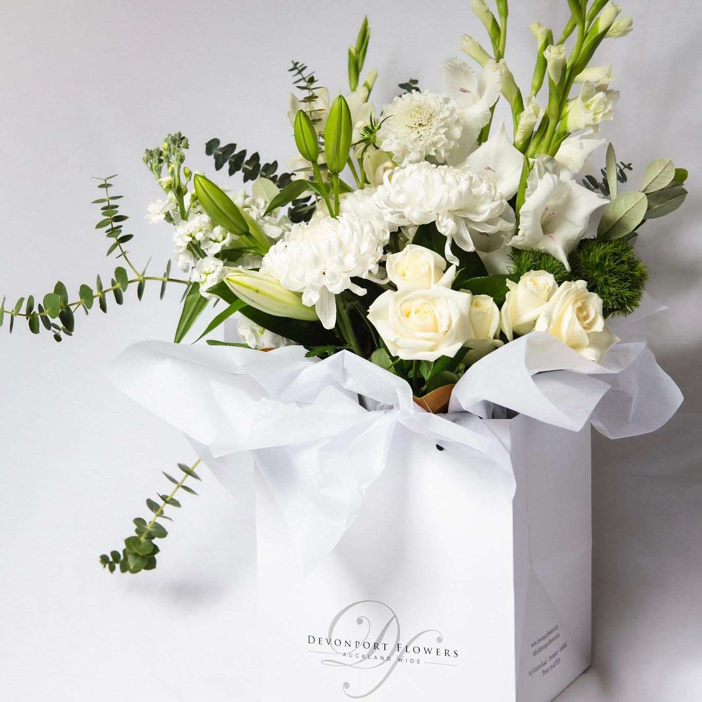 Let us design for you a dreamy bouquet of seasonally fresh white and green floral vibes for that someone special.