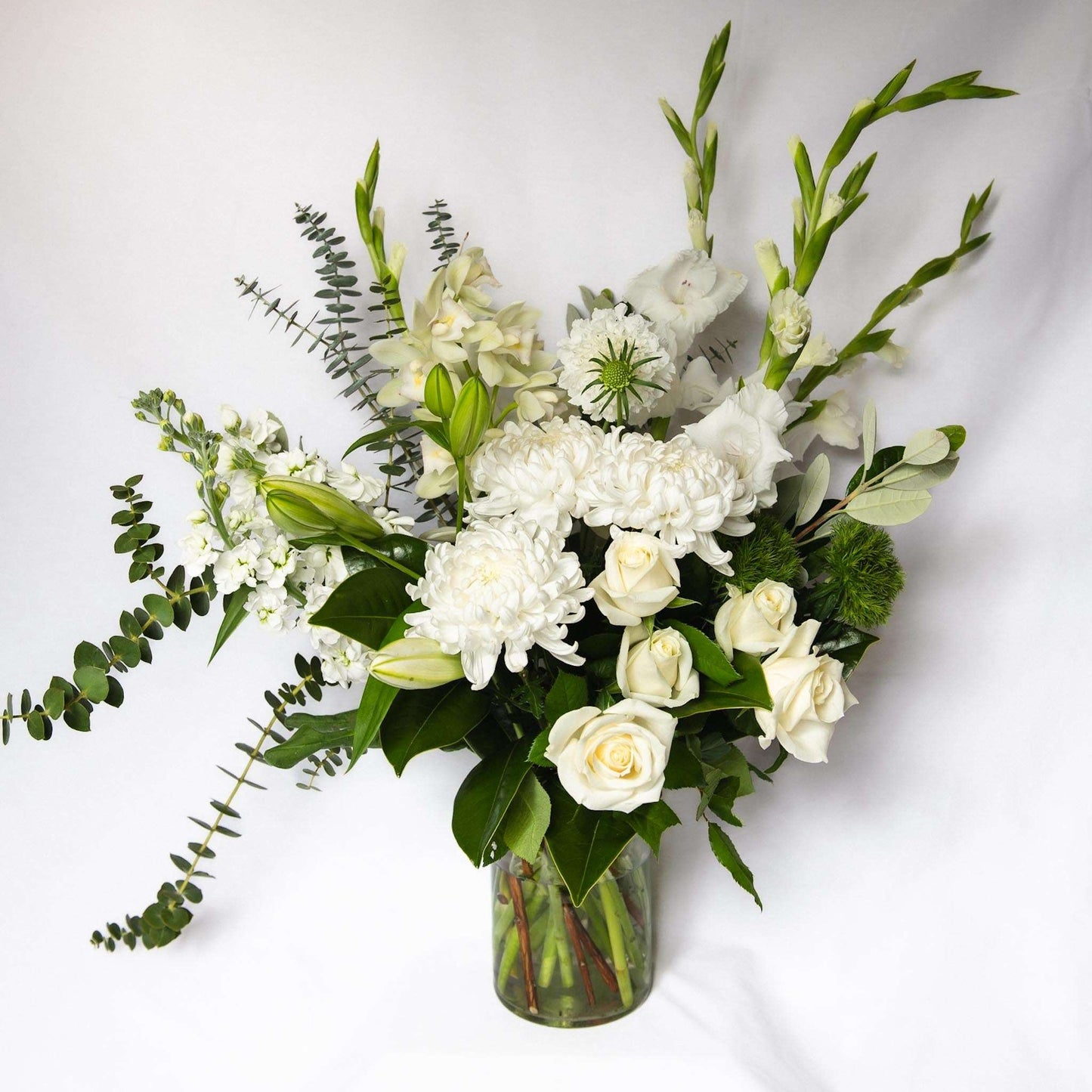 Let us design for you a dreamy bouquet of seasonally fresh white and green floral vibes for that someone special.