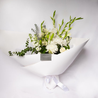 Let us design for you a dreamy bouquet of seasonally fresh white and green floral vibes for that someone special.